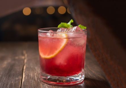 Cranberry Spritz Mocktail with orange slices garnish