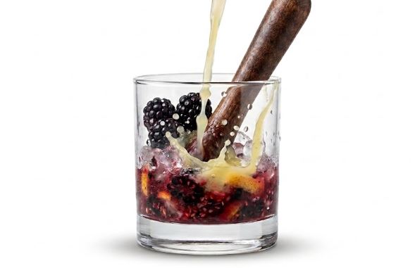 Muddle blackberries, syrup, and lemon